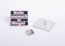Metalpin "Kein Mensch ist illegal"